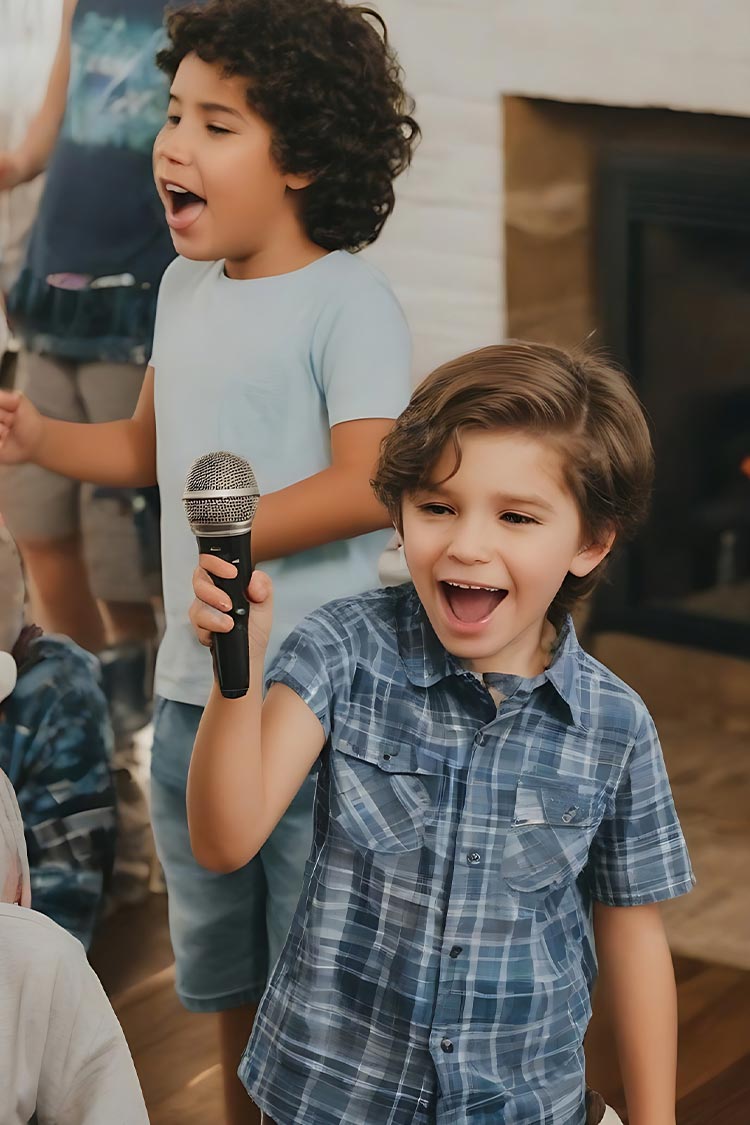 boy holding mic singing